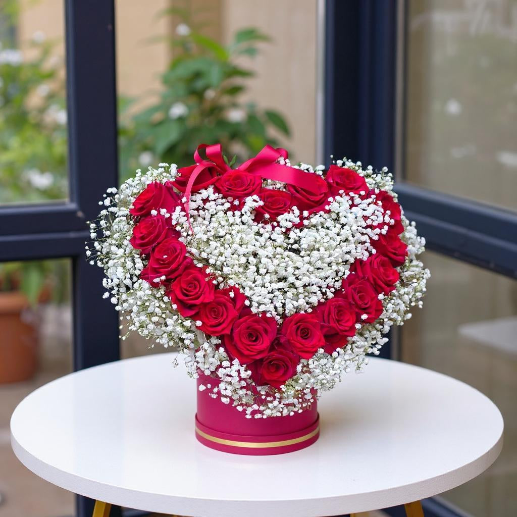 Box of roses and gypsophila with heart
