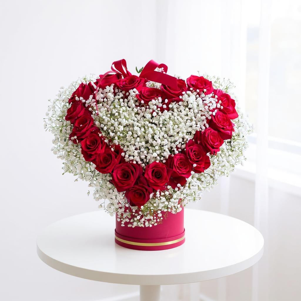 Box of roses and gypsophila with heart